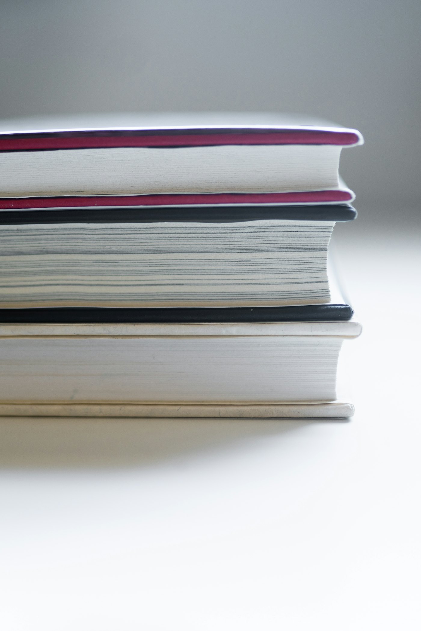 A neat stack of bound books
